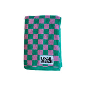 Local Beach Checker Beach Towels in Kelly/bubblegum checkerboard pattern. Made from heavyweight 100% cotton jacquard terry for soft, absorbent comfort at the beach, lake, pool, or bath.