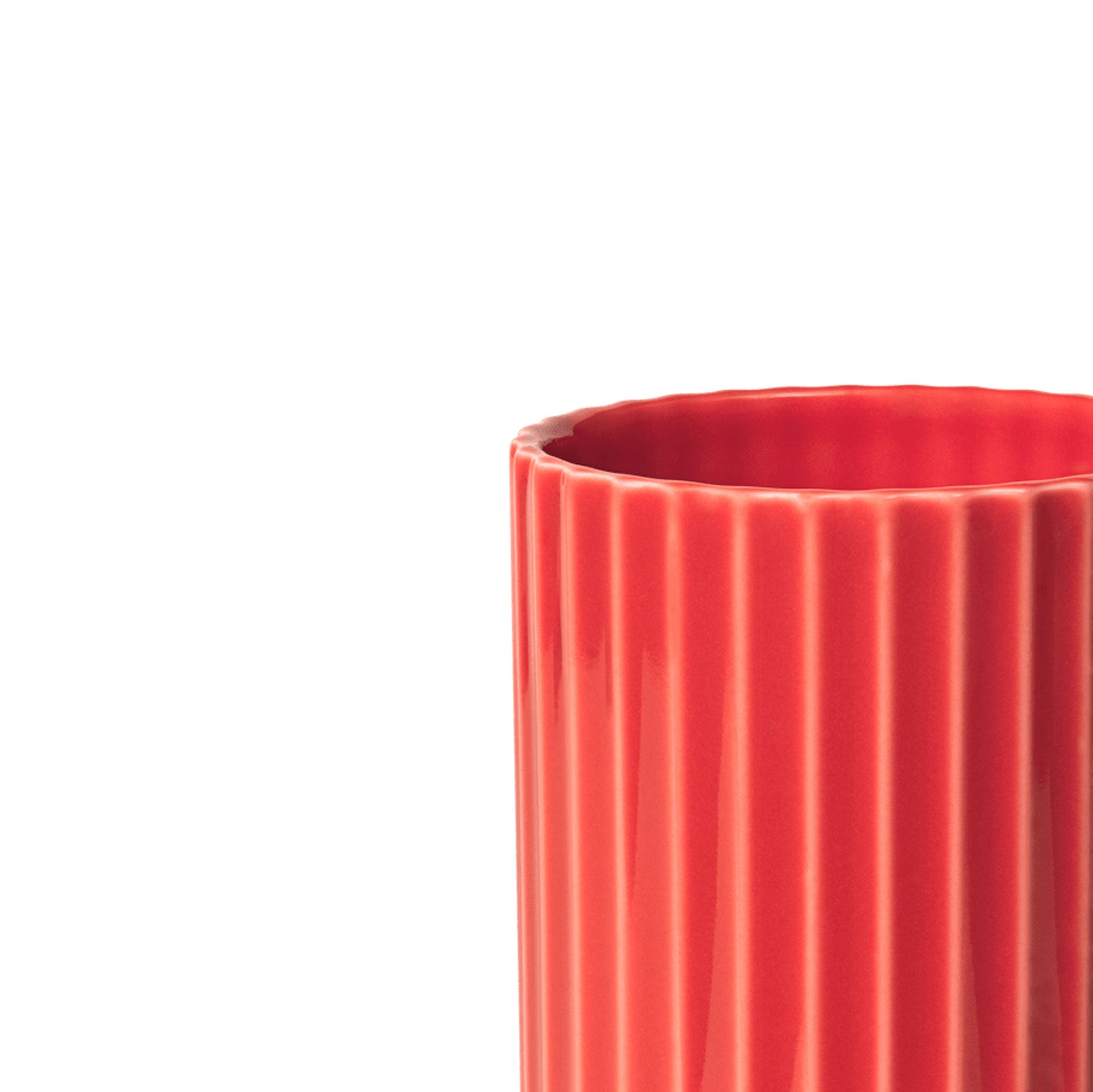 Lyngby Porcelæn Grooved H15.5 red porcelain vase with vertical grooves by Karakter Copenhagen, 6.1 inches tall.