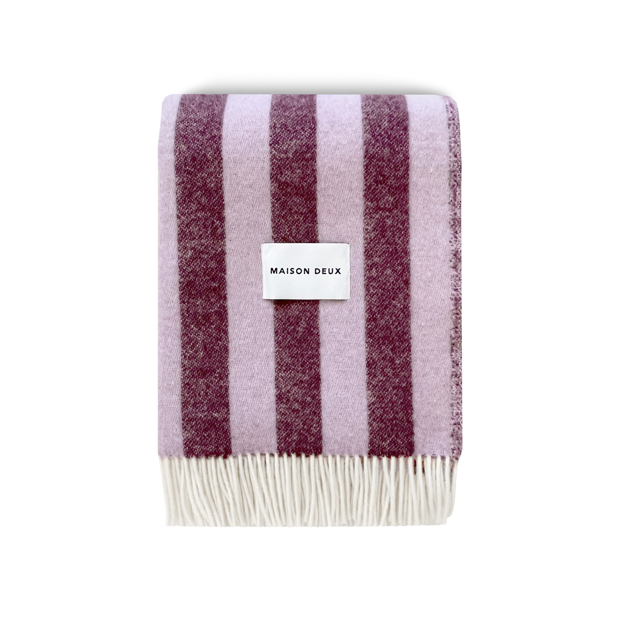 Maison Deux Candy Wrap Blanket in lilac and aubergine lambswool, cheeky reversible candy-stripe throw for sofa or bed.