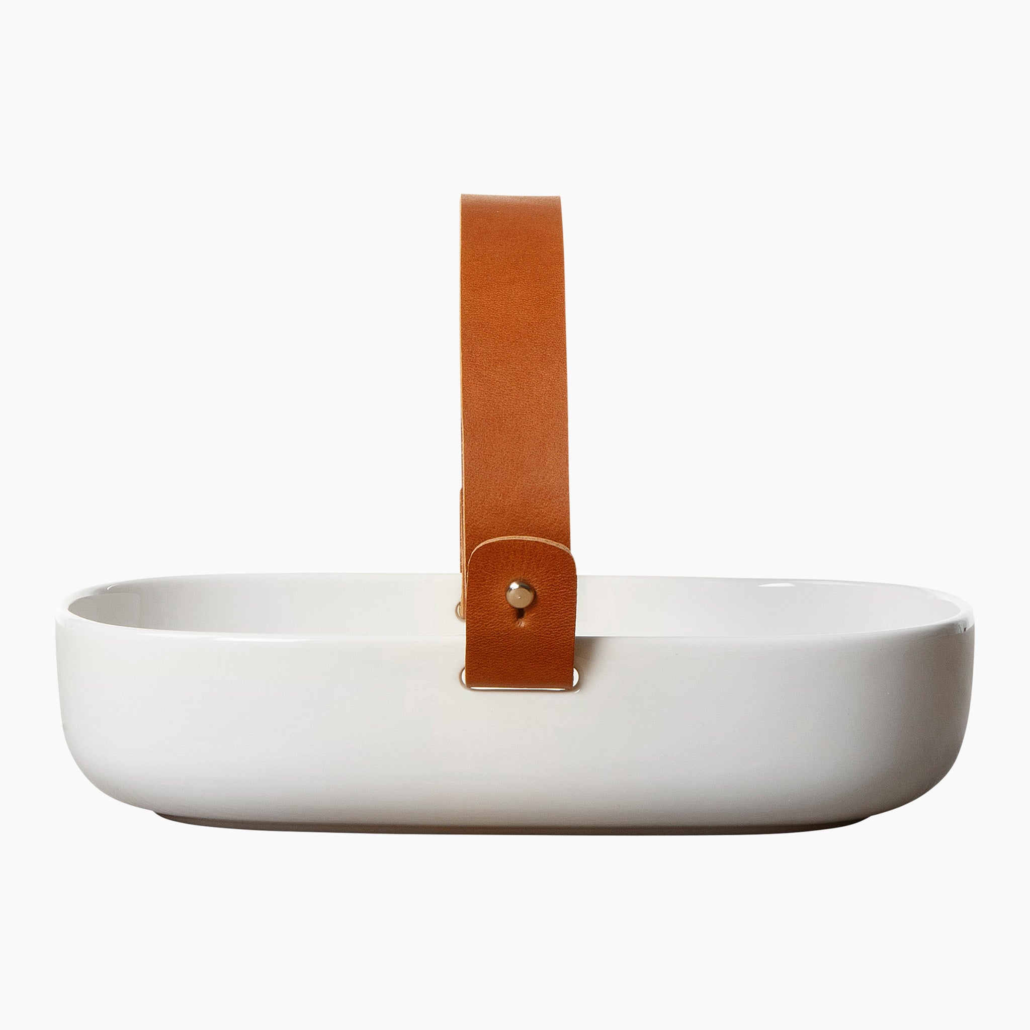 Koppa Serving Dish by Marimekko in white stoneware with a removable natural leather handle.