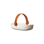Koppa Serving Dish by Marimekko in white stoneware with a removable natural leather handle.