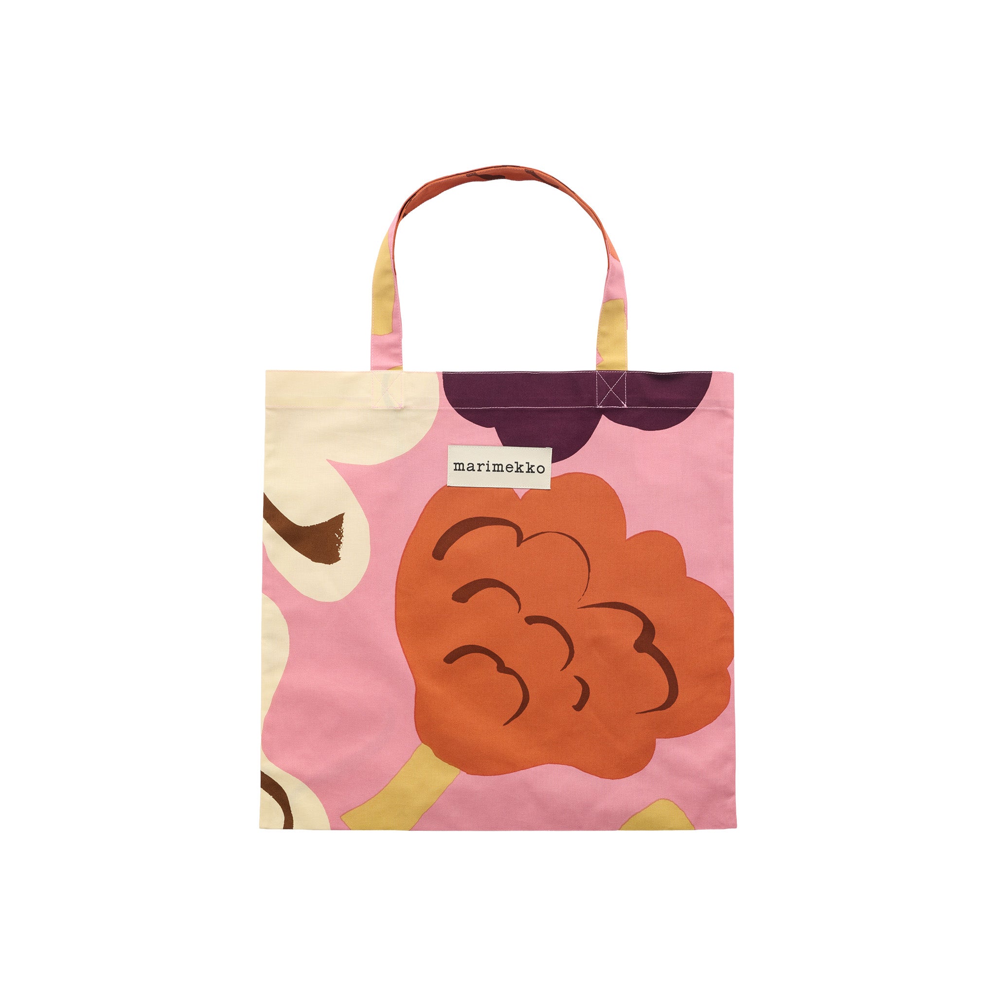 Marimekko Kukasta Kukkaan Tote Bag in pink, plum, terracotta, and off-white with oversized floral pattern by Erja Hirvi.