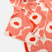 Unikko Hand Towel by Marimekko in bold floral pattern, 100% organic cotton terry towel in rectangular 50 × 70 cm size, soft and absorbent for bathroom or kitchen use.
