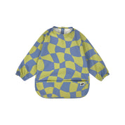 Long sleeve smock bib in six artist-designed colorways. Waterproof, recycled fabric, fits 6 months–3 years—extra coverage for mealtime and crafts.