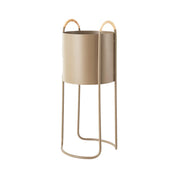 Maki Plant Box in Clay with rattan handles, shown in High version.
