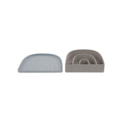 OYOY Rainbow Plate & Bowl Set in dusty blue and clay, durable silicone dinnerware for kids, dishwasher and microwave safe.