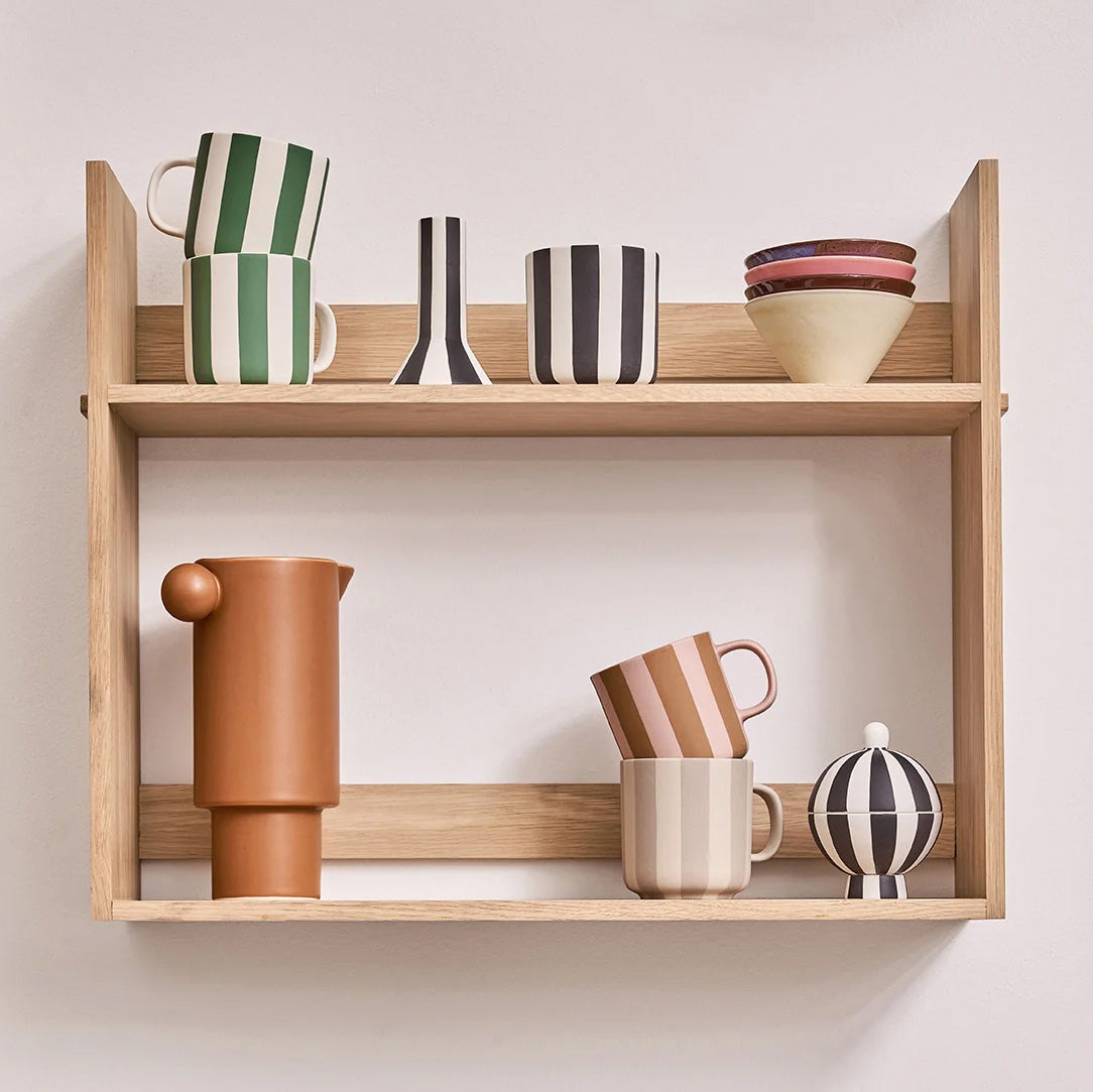 Toppu Mug by OYOY Living Design in hand-painted stoneware stripes, handmade and dishwasher safe, available in multiple colors.