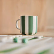 Toppu Mug by OYOY Living Design in hand-painted stoneware stripes, handmade and dishwasher safe, available in multiple colors.