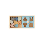 Wooden puzzle box made of natural beech wood with sliding shape pieces in soft Scandinavian colors, designed for toddlers ages 2 and up.
