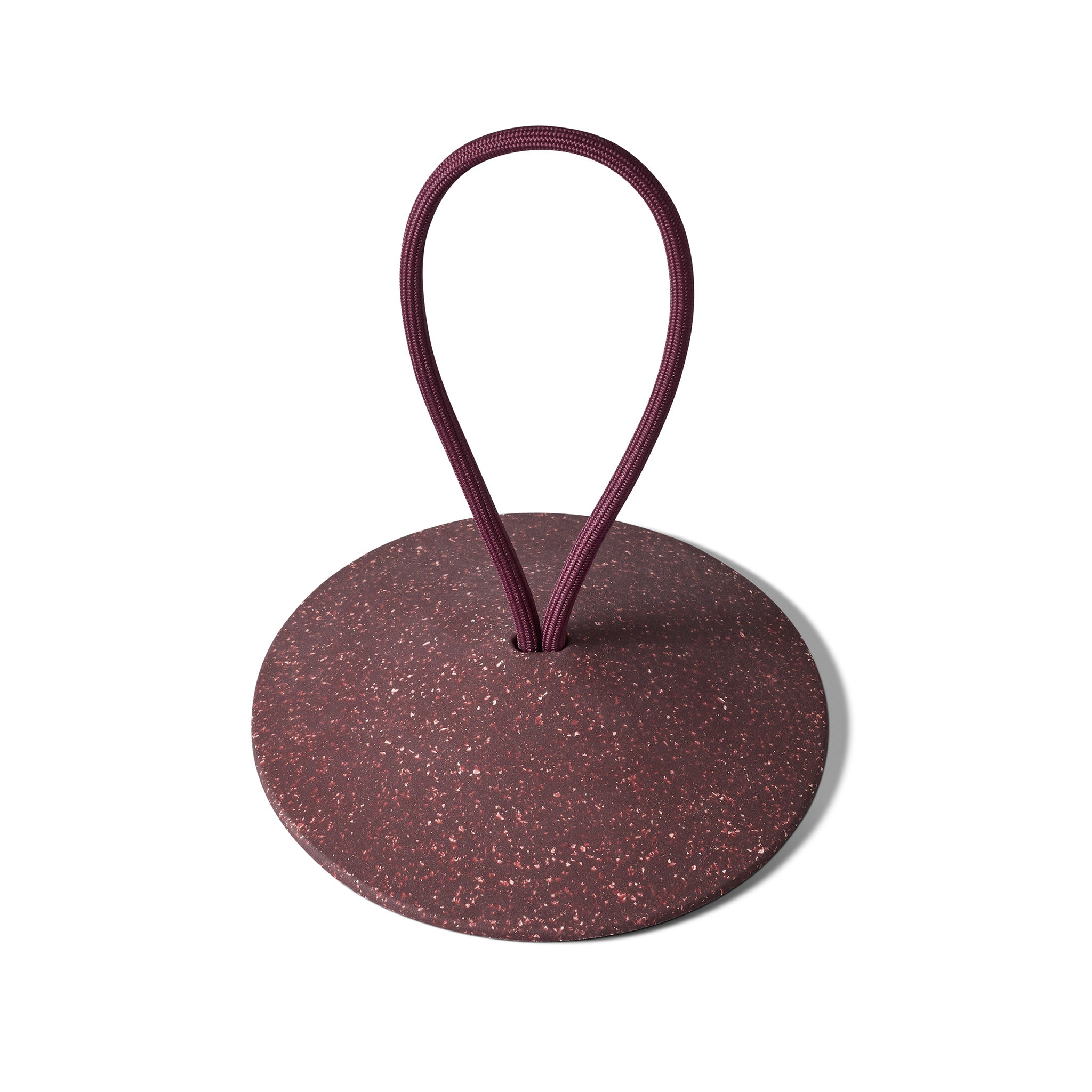 Pidät STOP round speckled rubber doorstop with recycled polyester rope, designed by Studio Gorm and made in Portugal.