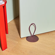 Pidät STOP round speckled rubber doorstop with recycled polyester rope, designed by Studio Gorm and made in Portugal.