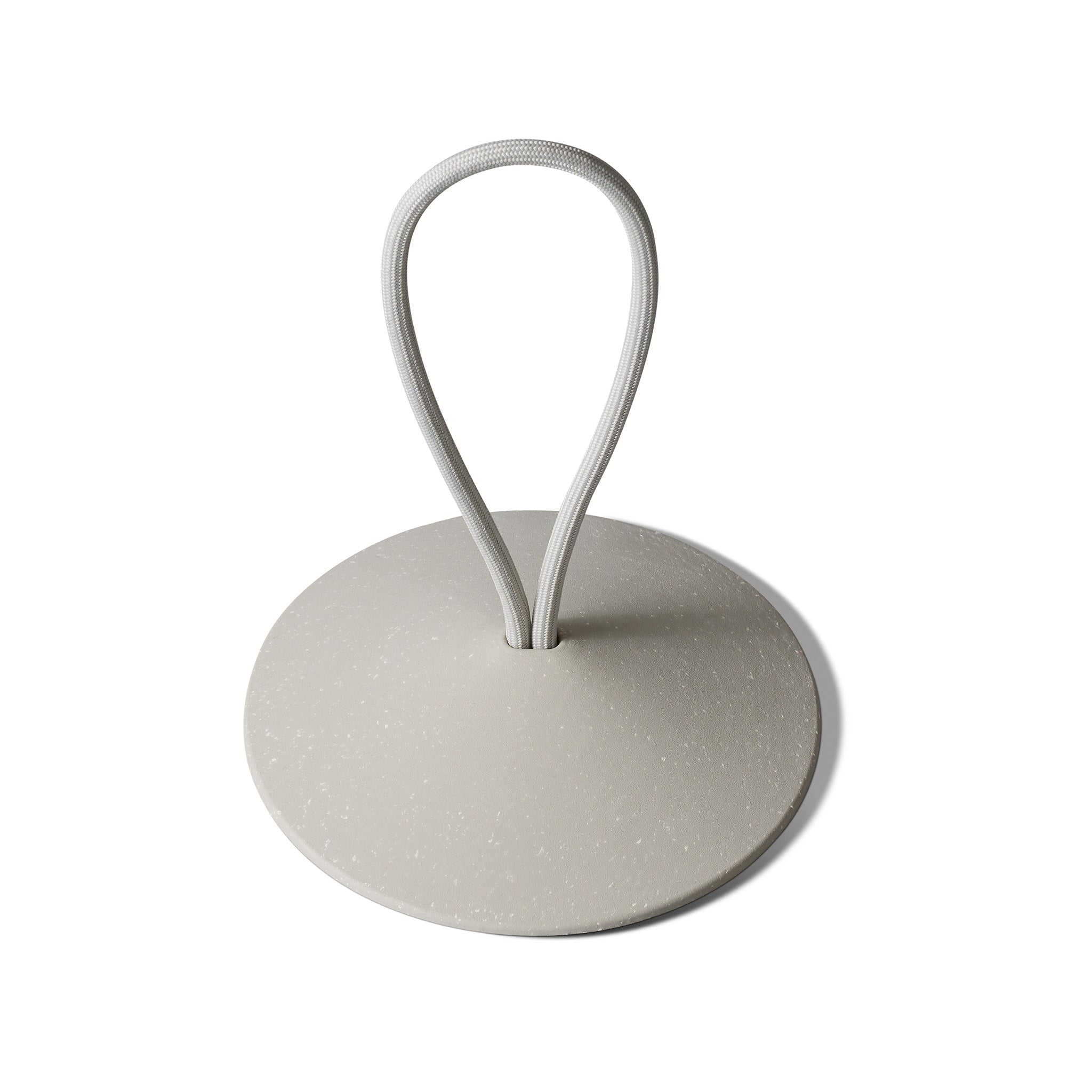 Pidät STOP round speckled rubber doorstop with recycled polyester rope, designed by Studio Gorm and made in Portugal.