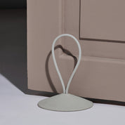 Pidät STOP round speckled rubber doorstop with recycled polyester rope, designed by Studio Gorm and made in Portugal.