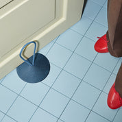 Pidät STOP round speckled rubber doorstop with recycled polyester rope, designed by Studio Gorm and made in Portugal.