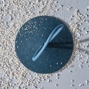 Pidät STOP round speckled rubber doorstop with recycled polyester rope, designed by Studio Gorm and made in Portugal.