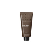 Skandinavisk HYGGE Hand Cream 75 ml with black tea, mint leaves, dried apple, and cinnamon fragrance.