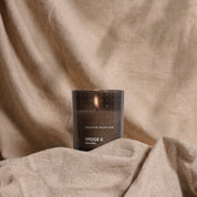 Skandinavisk Hygge 200g scented candle in frosted glass jar with wooden lid.