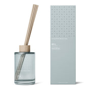 Skandinavisk Øy 200ml scent diffuser in painted glass bottle with wooden ring and reeds.