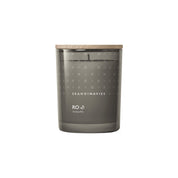 Skandinavisk Ro Scented Candle inspired by Scandinavian tranquility with fresh green notes of cut grass, cucumber, wild violets, and fallen leaves.