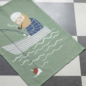 Ebbot Kitchen Towel by Spira of Sweden featuring a whimsical illustrated character on a natural linen-cotton blend towel, designed for drying dishes and adding Scandinavian charm to the kitchen.