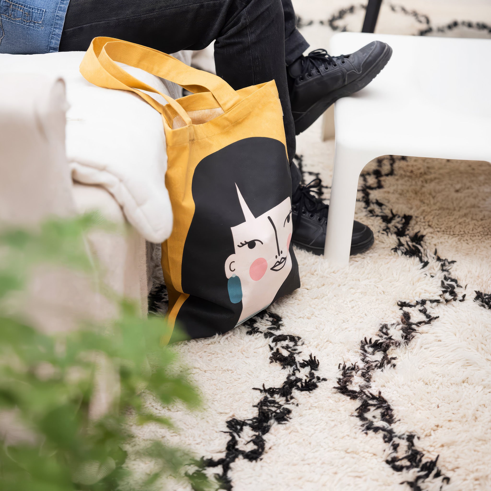 Spira of Sweden Naomi Kompiskasse Tote Bag in ochre cotton with hand-printed illustrated woman with long black hair.