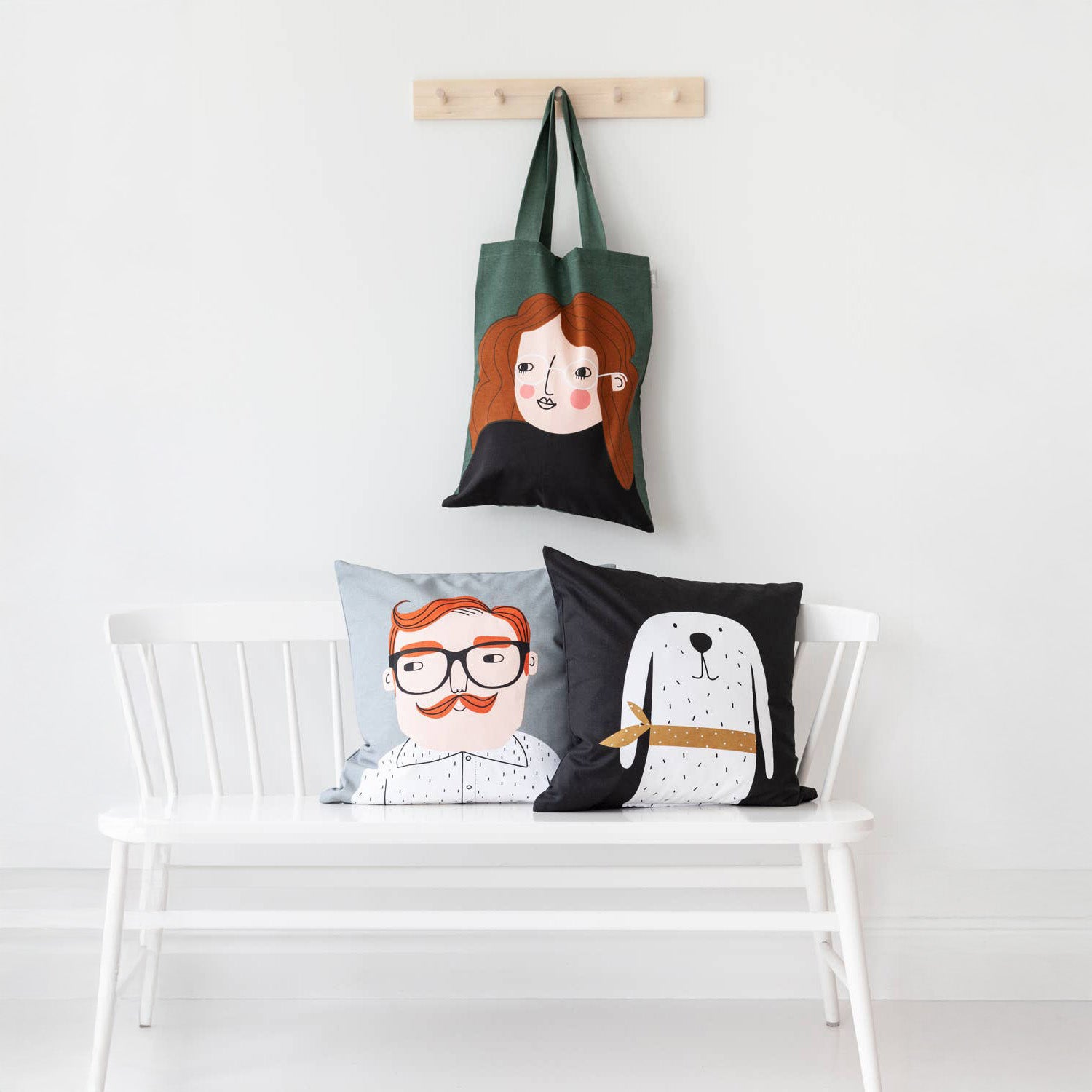 Kompiskudde Luke Cushion Cover by Spira of Sweden, natural cotton pillow cover with illustrated Luke character, 20" × 20".