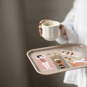 Small rectangular Strandhäng Kompisbricka tray by Spira of Sweden with colorful summer beach illustration on birch veneer.