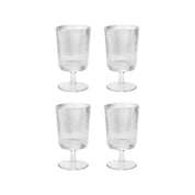 Pilastro Wine Glass Set by Stelton with four clear ribbed wine glasses featuring an Art Deco-inspired design and footed base.