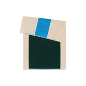 Aqua Dark Green Bath Mat by SUITE702 in aqua, dark green and cream with a reversible graphic design.
