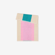 Turquoise Purple Toffee Guest Towel Set by SUITE702 with three reversible colorful guest towels.