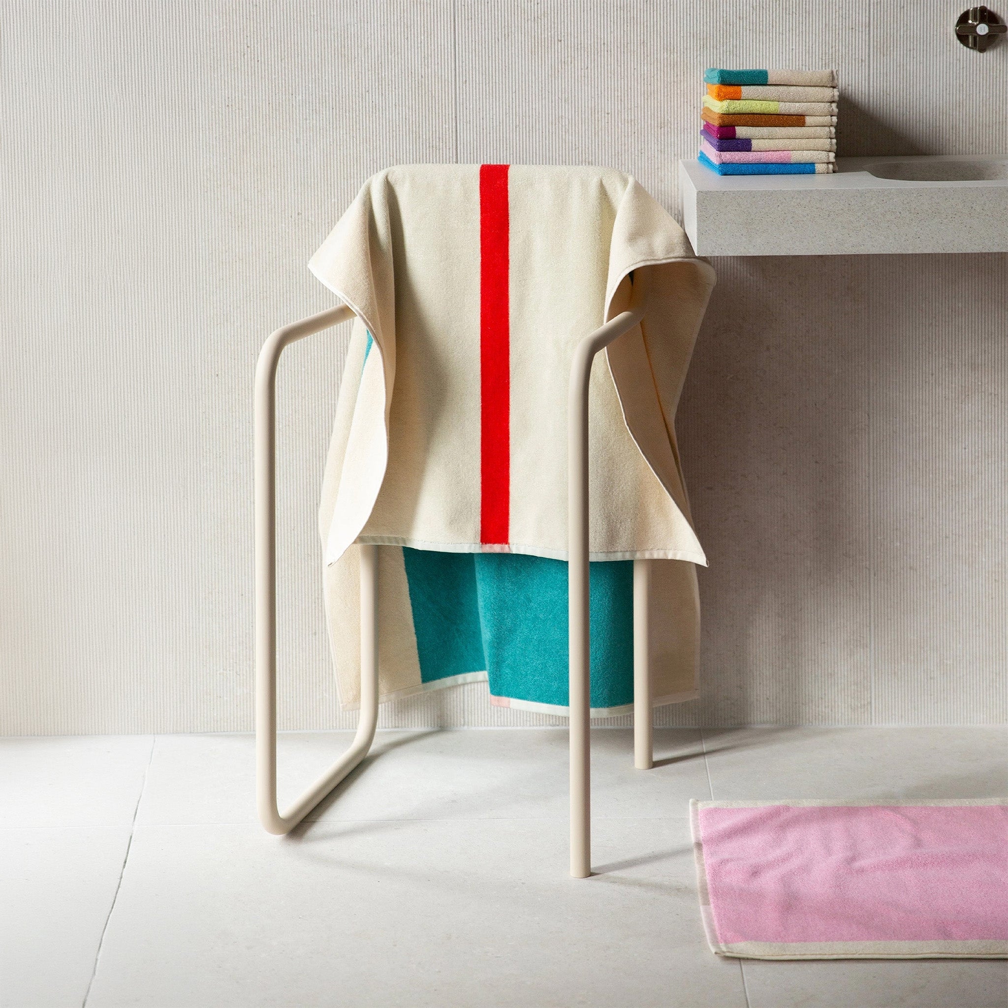Red Turquoise Bath Towel by SUITE702 with graphic red and turquoise color-block design.