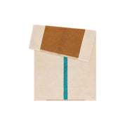 Toffee Turquoise Bath Mat by SUITE702 in toffee, turquoise and cream with a reversible graphic design.