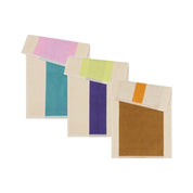 Turquoise Purple Toffee Guest Towel Set by SUITE702 with three reversible colorful guest towels.