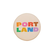Portland Colorblock Magnet featuring bold colorful lettering spelling Portland in a modern graphic design.