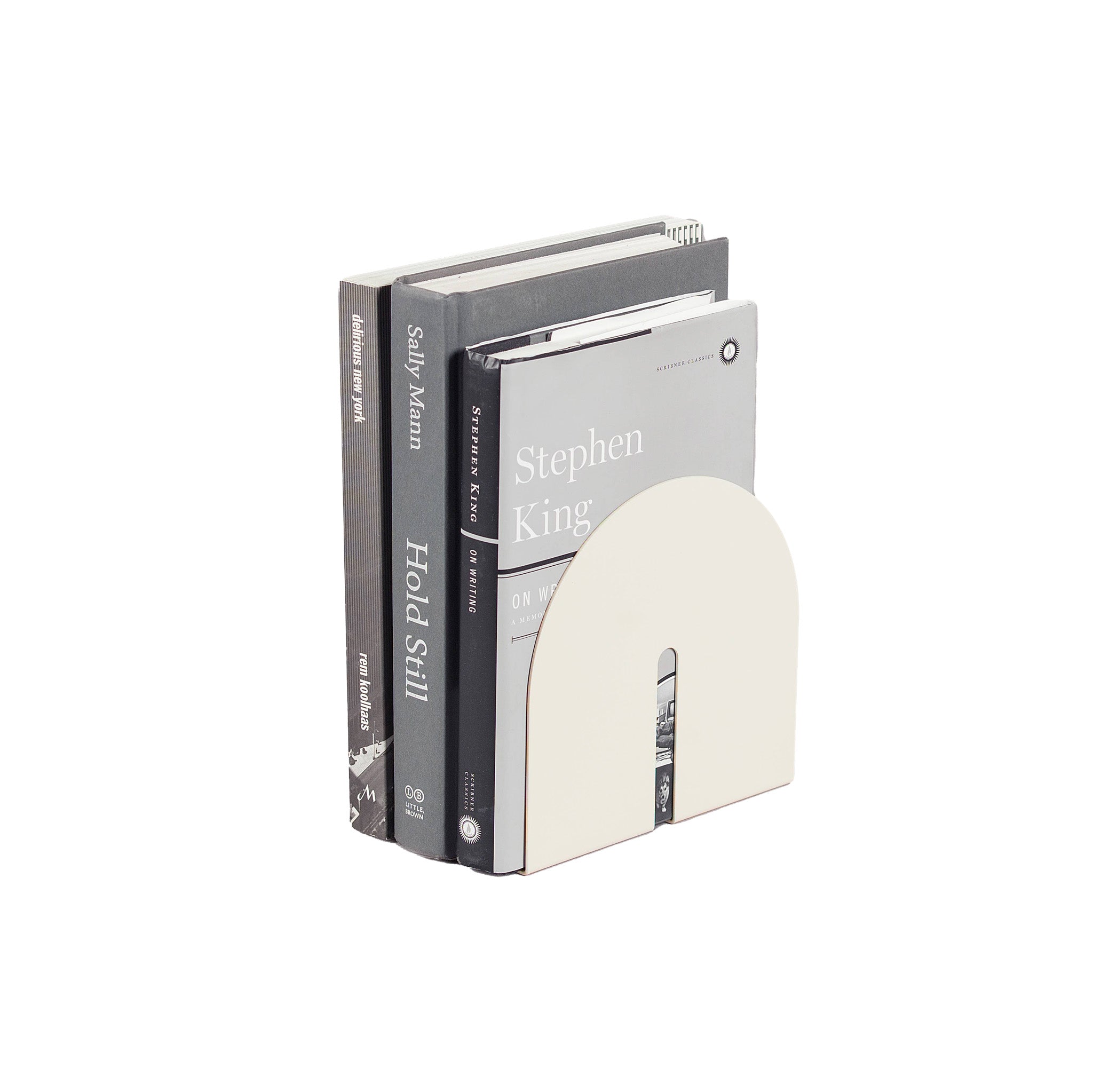Tortuga Forma Warm White Bookend, solid steel arc design for holding cookbooks, magazines, and novels.