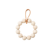 Verso Design KRANSSI Wreath Trivet in Birch with Leather loop, handcrafted Nordic bead design, usable as wreath or trivet.
