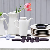 Verso Design PAPU Long Trivet, wool felt trivet with leaf-inspired design in grey, green, or silver. Made in Finland.