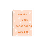 Thank You Sooo Much Card with orange hand-lettered text and white diamond shapes on a peachy pink background.