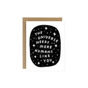 Worthwhile Paper The Universe Needs You Card featuring “The Universe Needs You” lettering surrounded by a cosmic pattern of stars and sparkles.